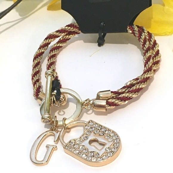 𝅺3/$29! GUESS Twisted Rope Bracelet with Lock - Picture 5 of 9
